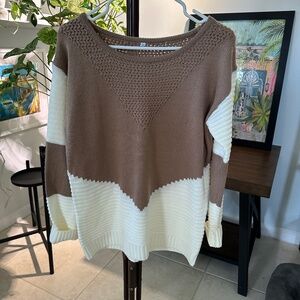 Sweater mixed stitch runs large